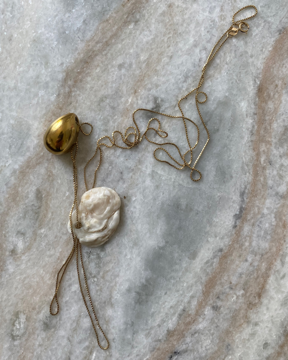 Rachelle Robinet’s locket with he father’s ashes