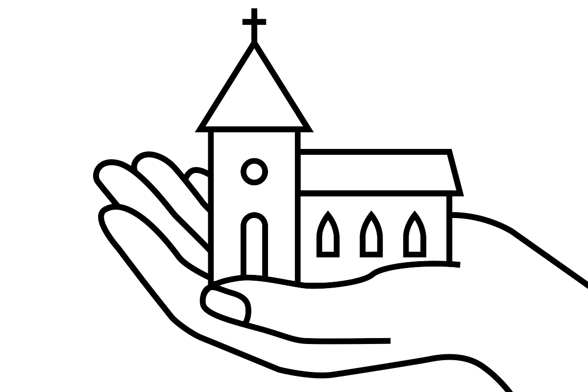 a hand holding a church